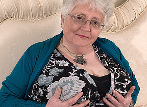 Big breasted British granny playing with personally