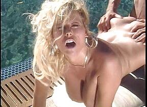 Blond fucking by the pool